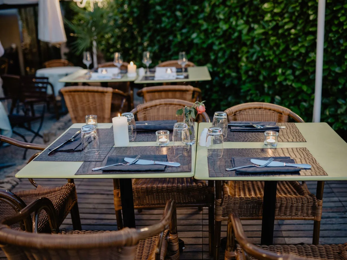 A casual table set with stackable dinnerware for a small gathering