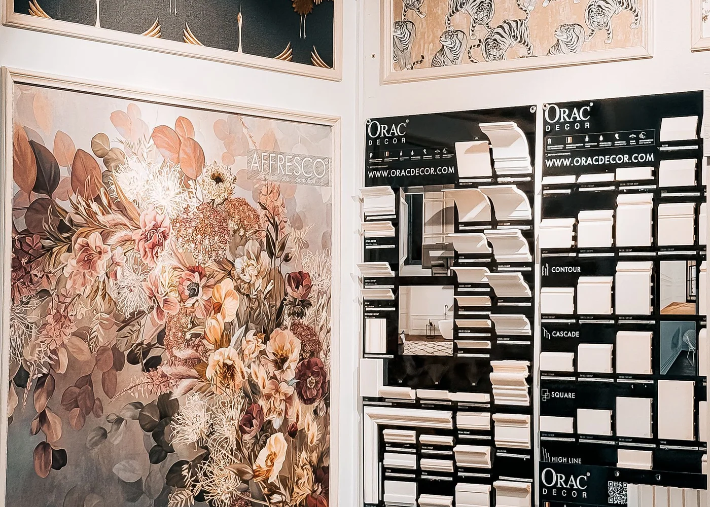 A collected home workspace with fabric samples and natural textures